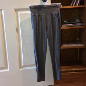 Gray leggings with a slit at the bottom